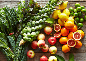 a group of fruits and vegetables on a wood surface Healthy Weight Loss Diets Bagshot